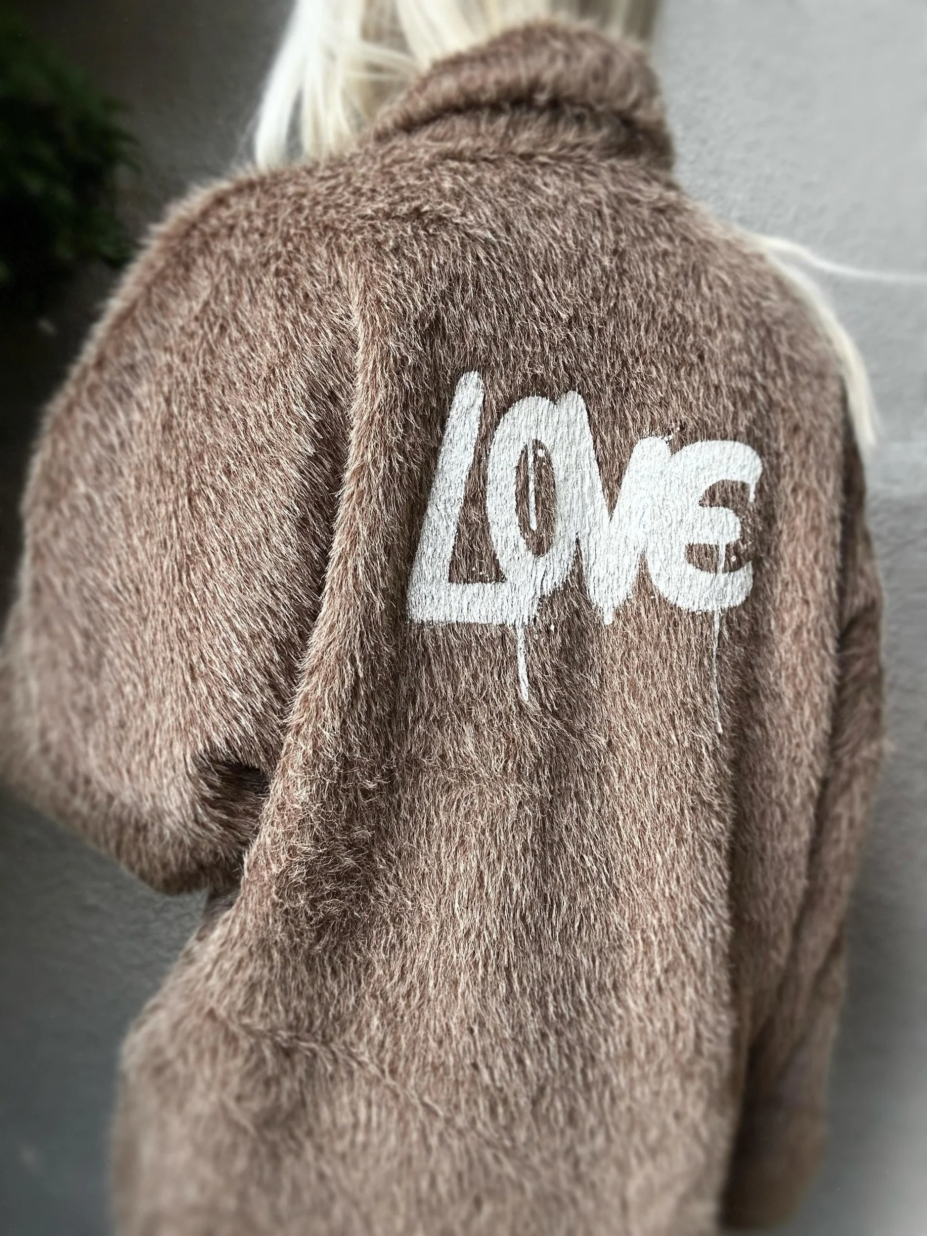 Back view of brown Banditas Napili LOVE Jacket featuring white LOVE lettering