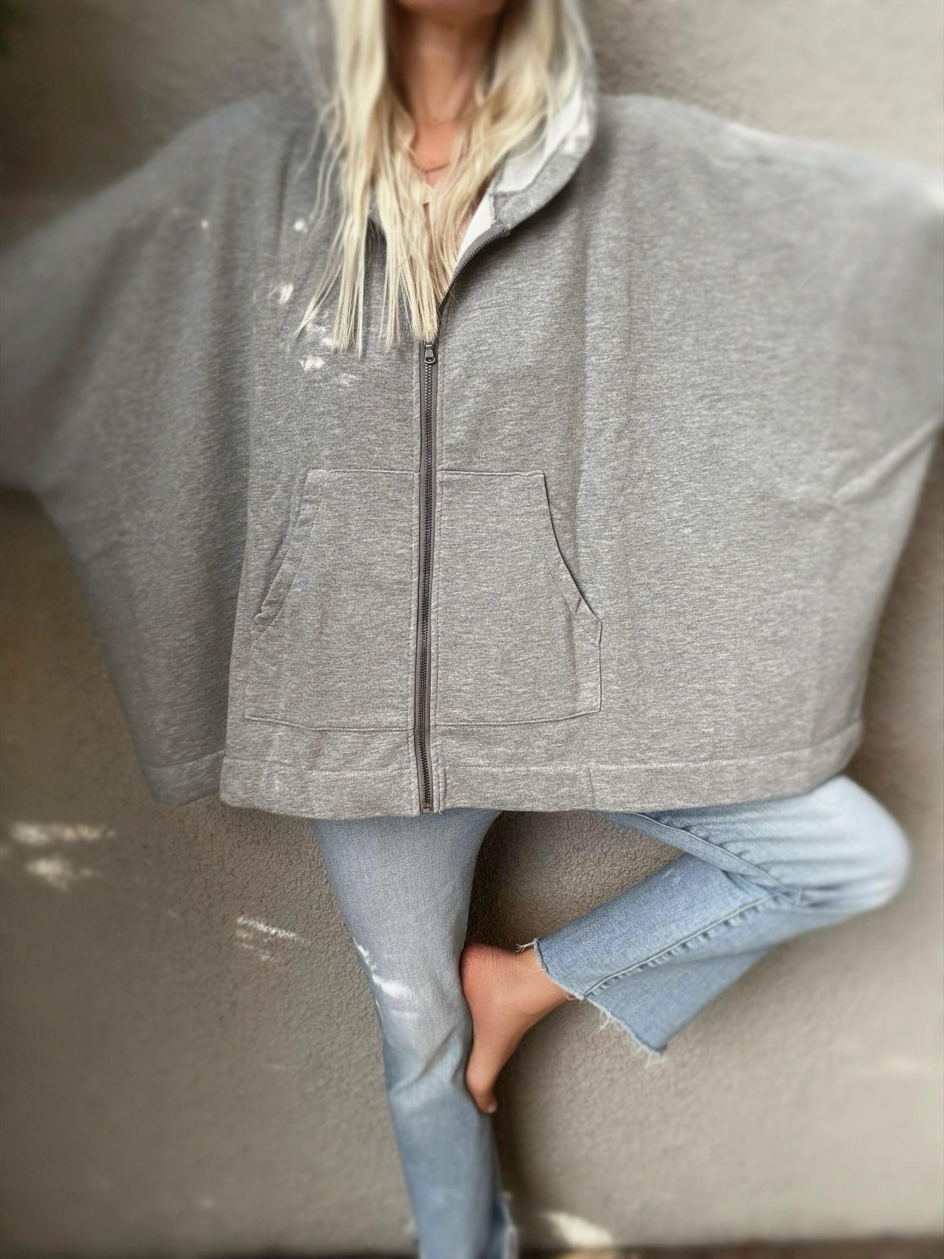 Grey Banditas Paradise zip-up sweatshirt worn with light blue jeans and a white top