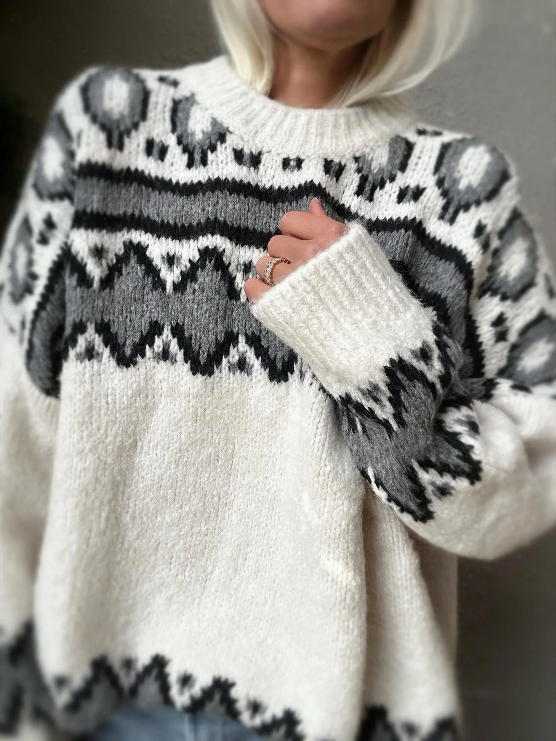 Front detail of the cream and black Coastal Thread Makawao Sweater