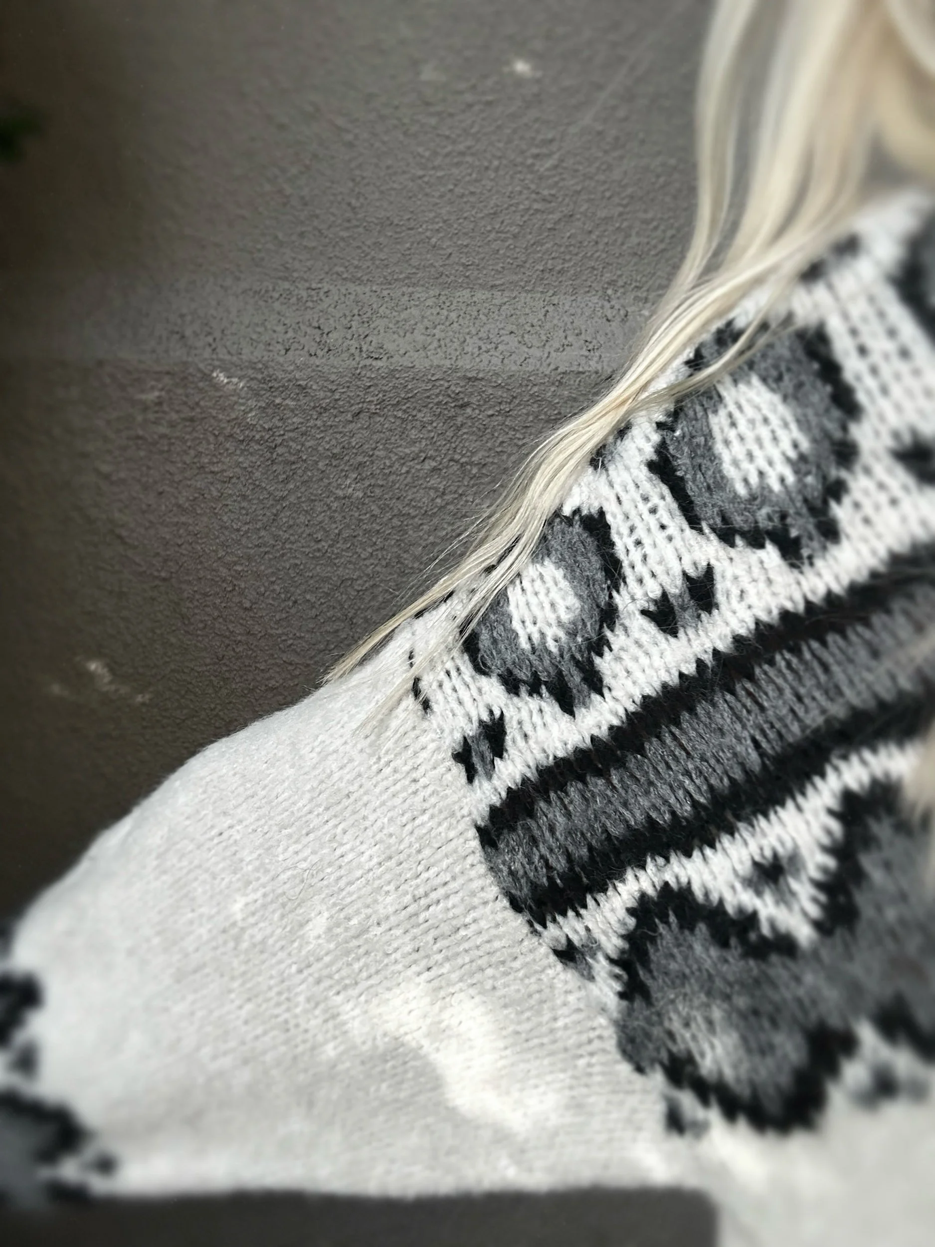 Arm view of the Banditas Makawao Sweater
