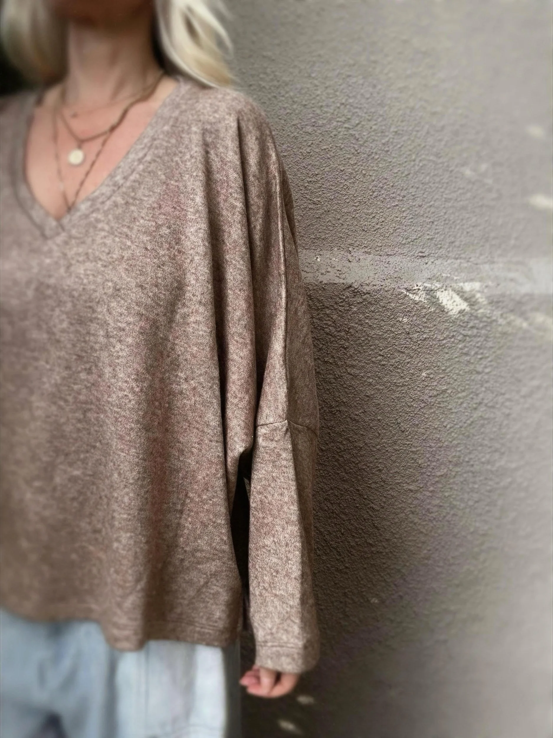 Front view of brown Banditas Haiku V-Neck Sweatshirt with loose sleeves and relaxed fit
