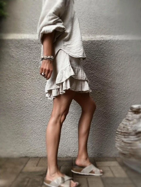 Capri Gauze Shirt and Capri Ruffle Skirt styled down with trainers.