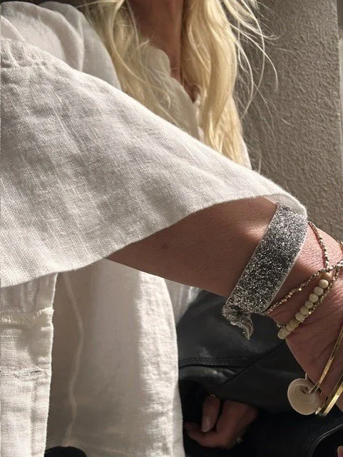 Women's silver sparkle bracelet styled for effortless everyday coastal jewelry