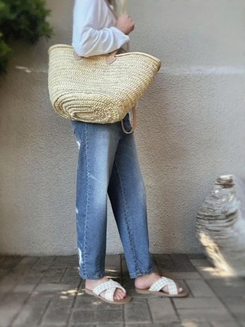 Woman wearing light blue stretch denim jeans with a relaxed everyday fit