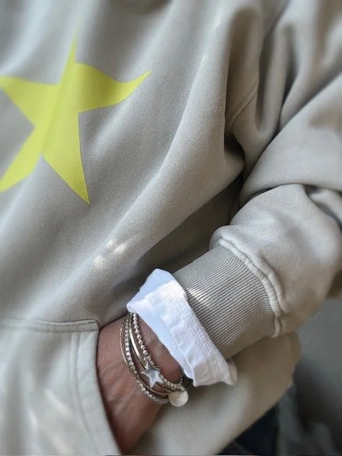 Women's cozy cotton blend hoodie with oversized fit and neon star detail