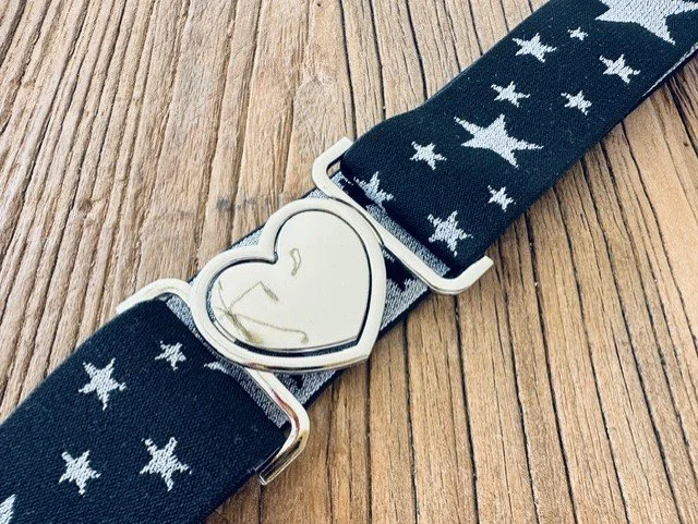 Women's stretch belt with silver heart buckle and star accents