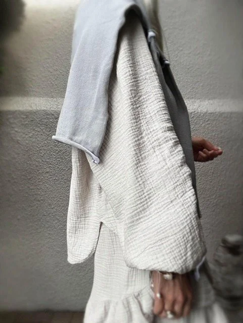 Sleeve and texture detail of the Capri Gauze Shirt in beige cotton gauze.