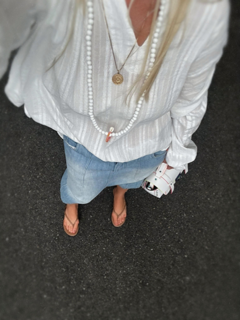 Banditas Flegrei oversized cream cotton shirt styled with jeans