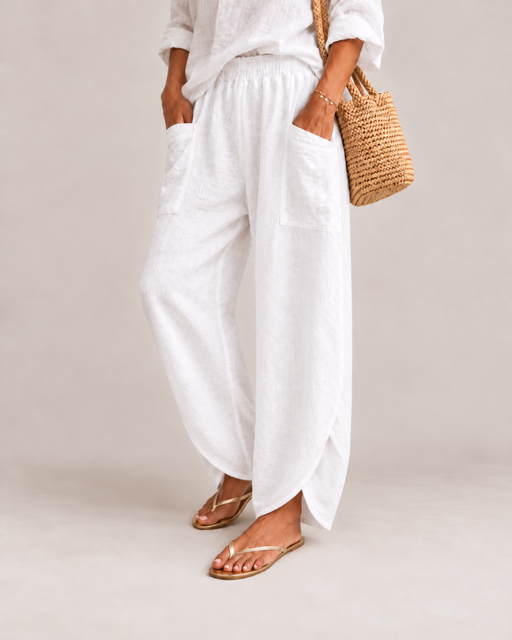 Paia Linen Jogger in White showing the Italian linen cotton texture and relaxed fit