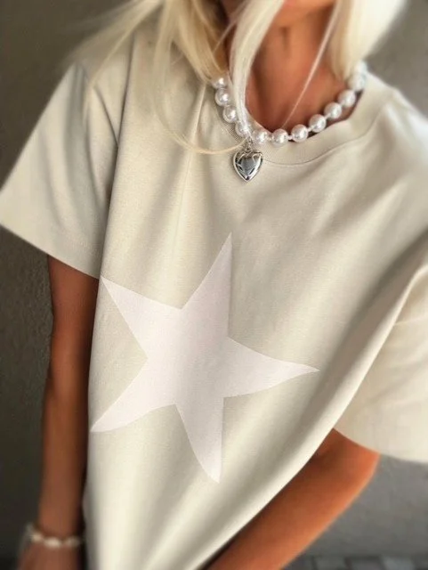 Cream heavyweight tee with oversized pale pink star and relaxed boxy fit