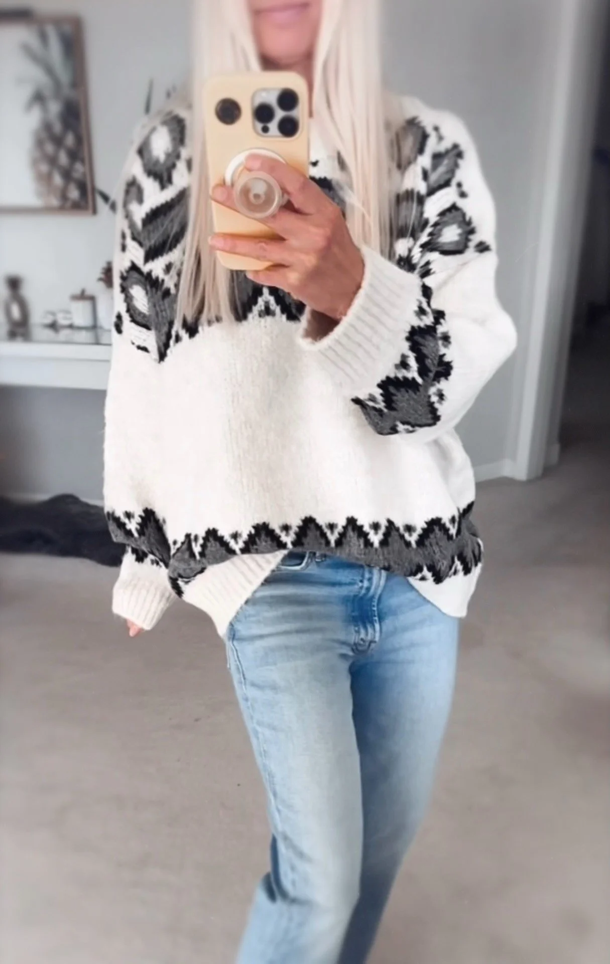 Coastal Thread Makawao Sweater cream with black worn with jeans