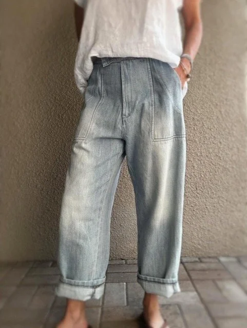 Full front view of Banditas Nashi light-wash barrel-leg jeans with rolled cuffs