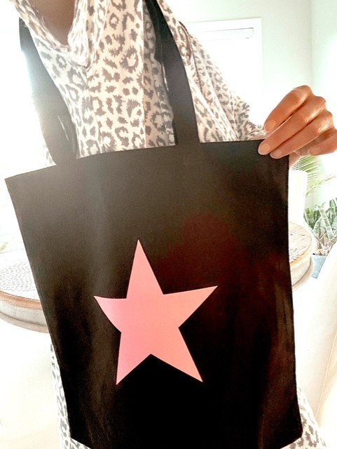 Women's everyday canvas tote with star graphic design for shopping and beach days