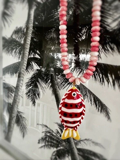 Pink and white beads with red and white fish pendant necklace