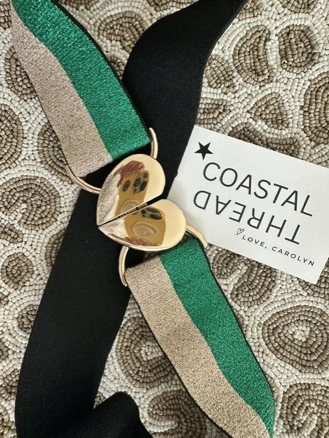 Women's green and gold ribbon heart belt with gold clasp detail