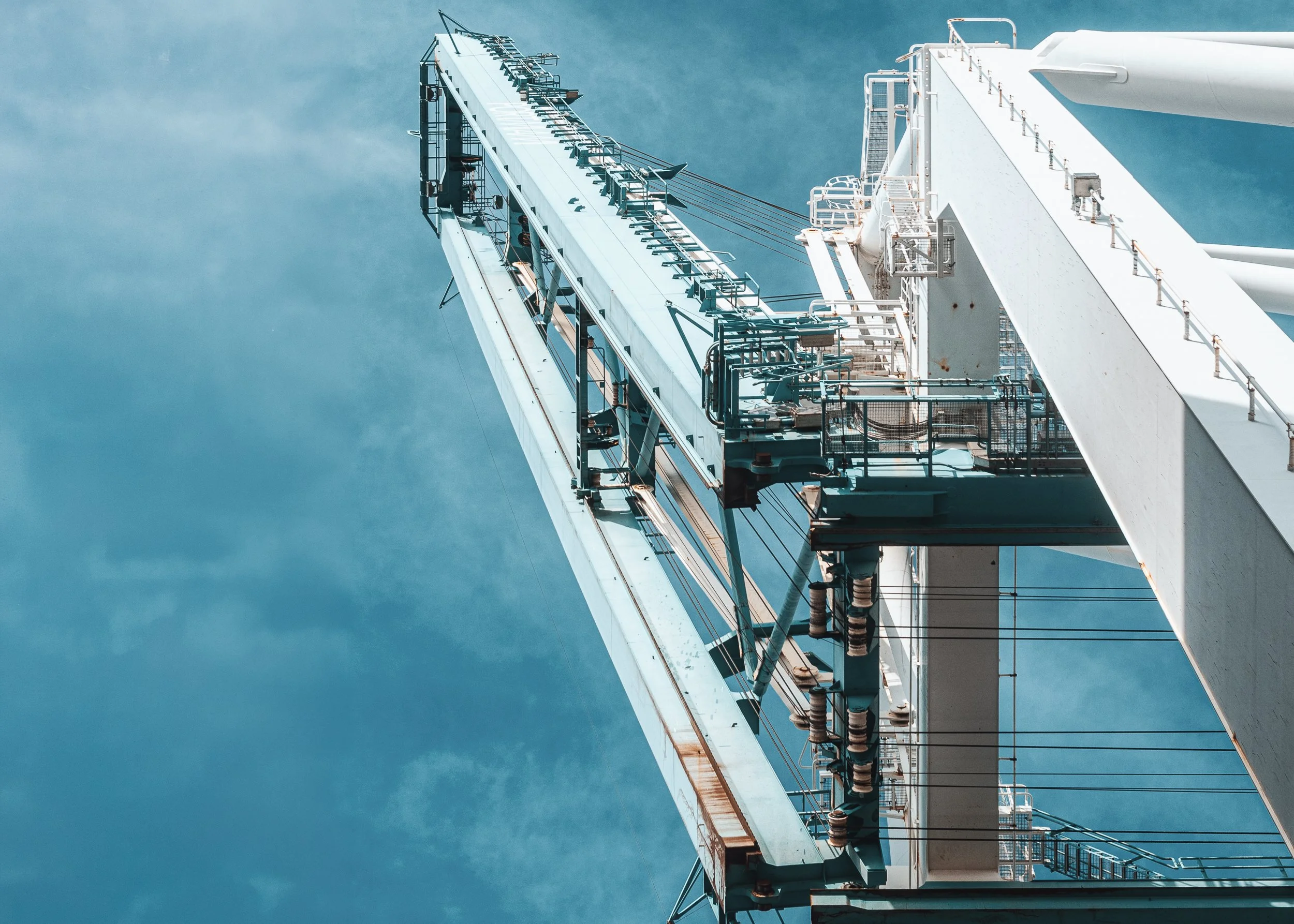 Container crane against a blue sky