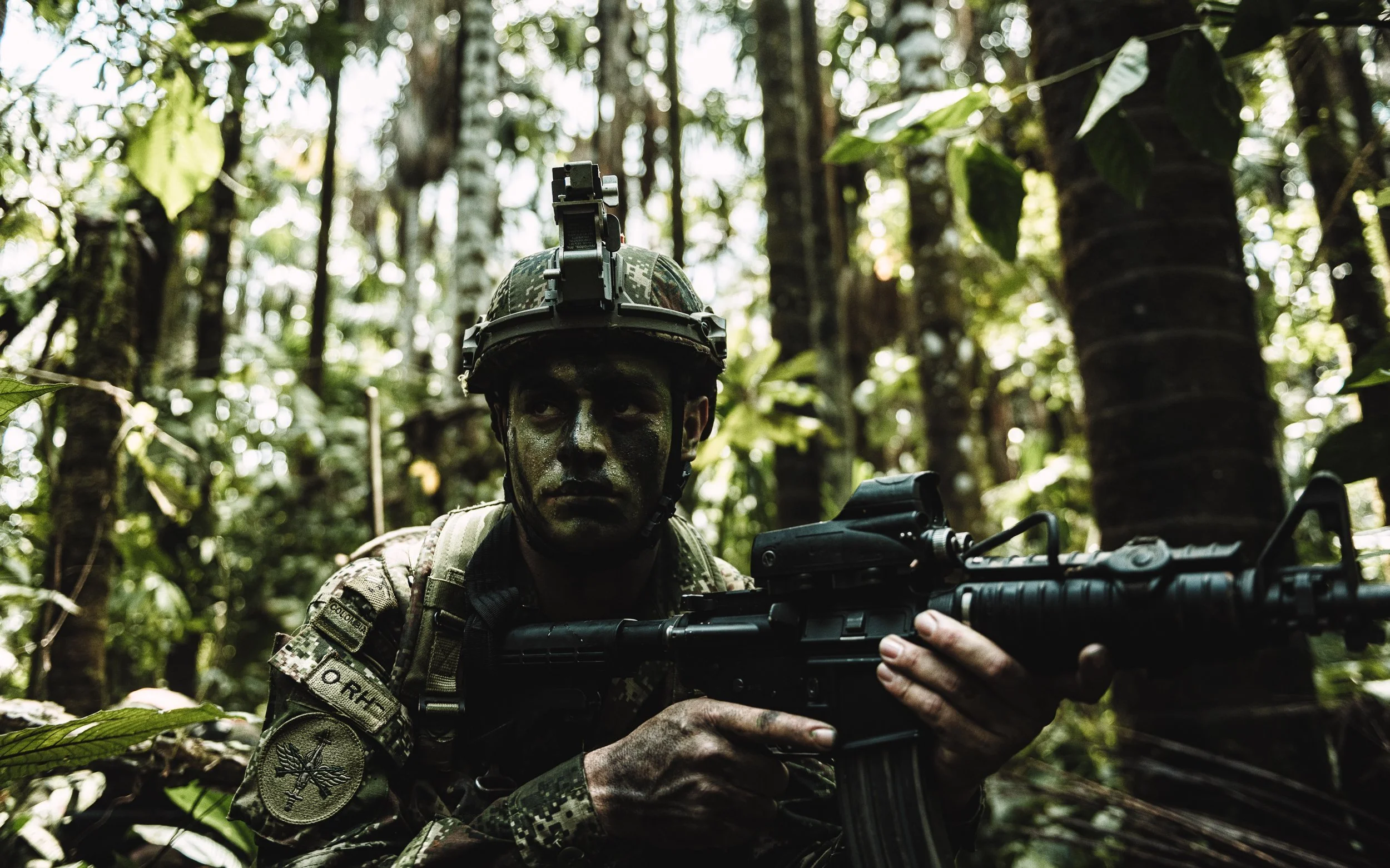 Soldier with a rifle in the jungle