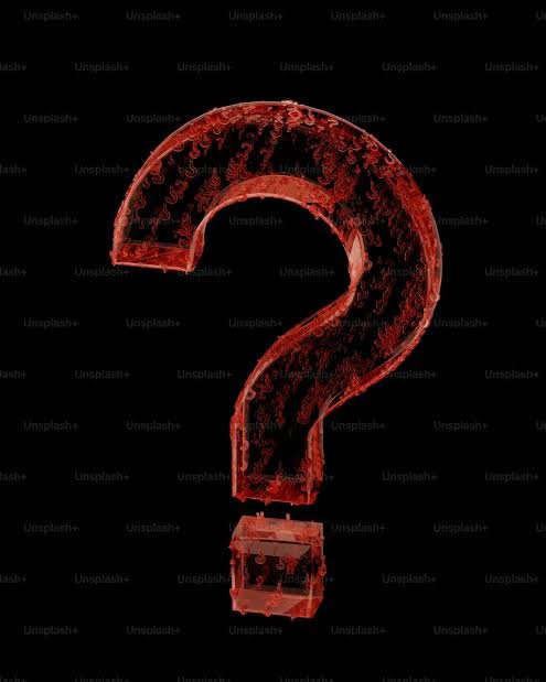 Red illuminated question mark on black background.