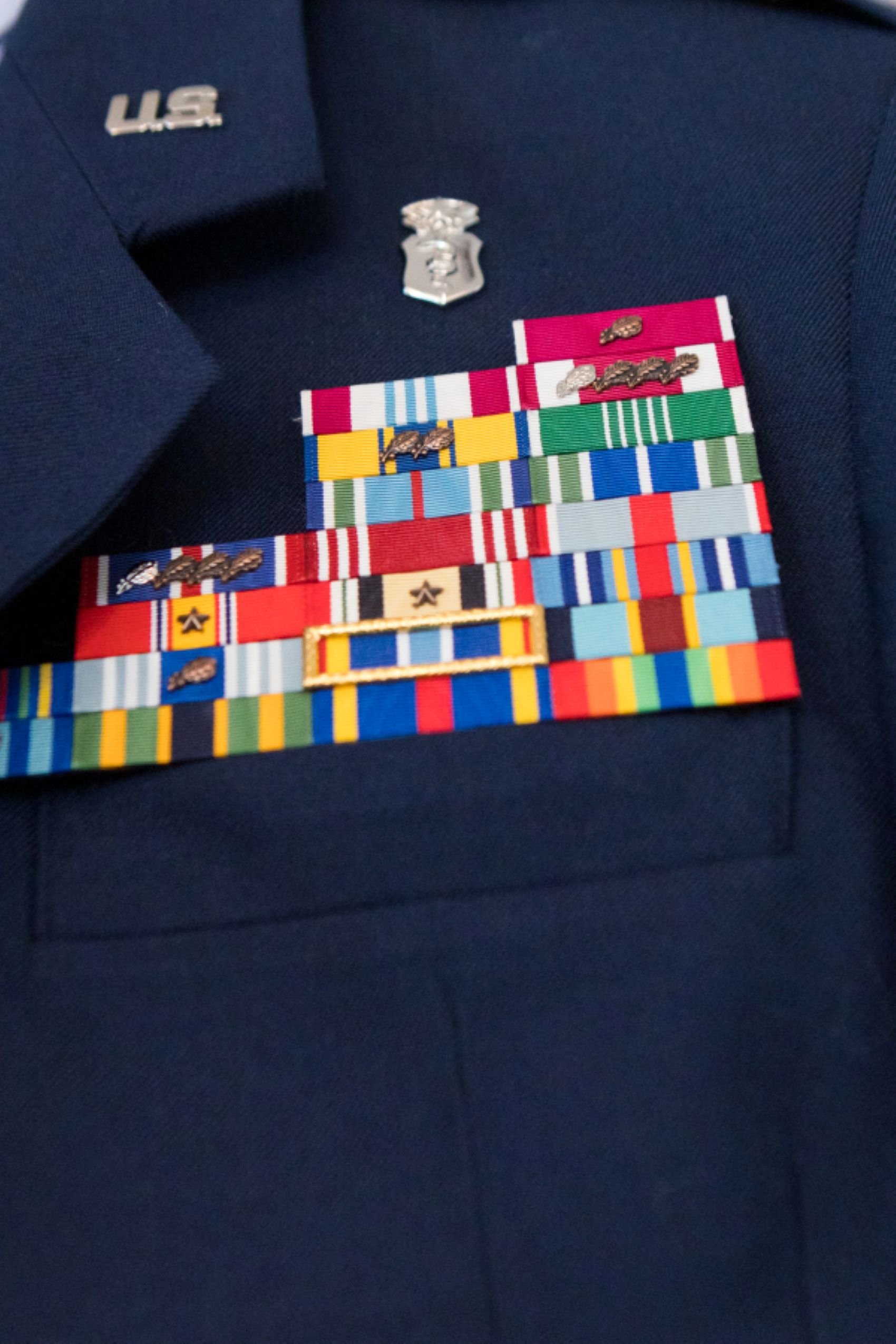 close up of US air force ribbons on blue uniform jacket