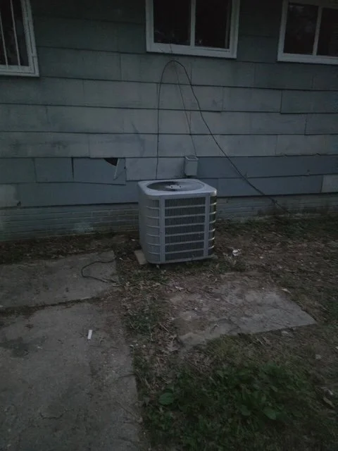 Before: An exposed, industrial AC unit disrupted the natural flow of the landscaping.