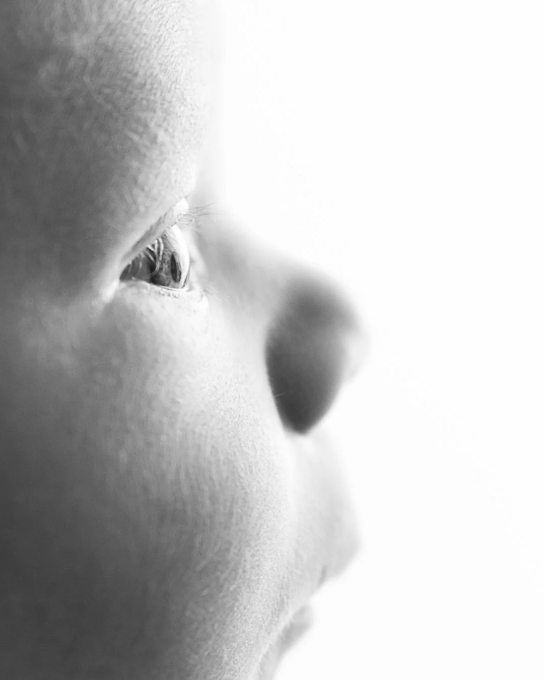 side profile of newborn baby during newborn in home photoshoot in worcester