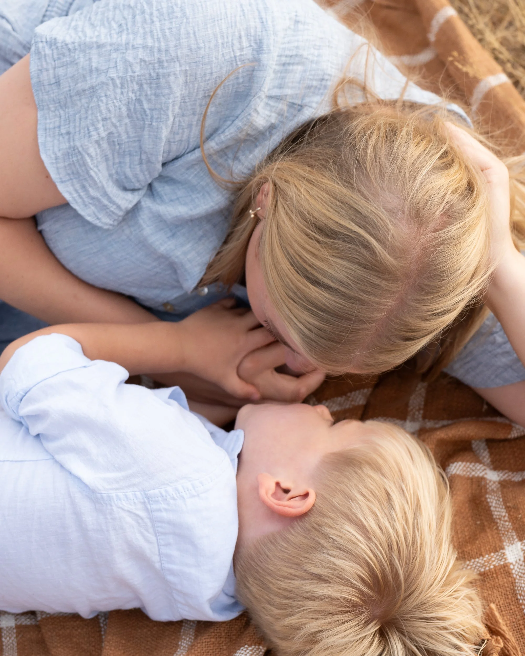 toddler and mum cuddling during family photoshoot in worcester, worcestershire UK