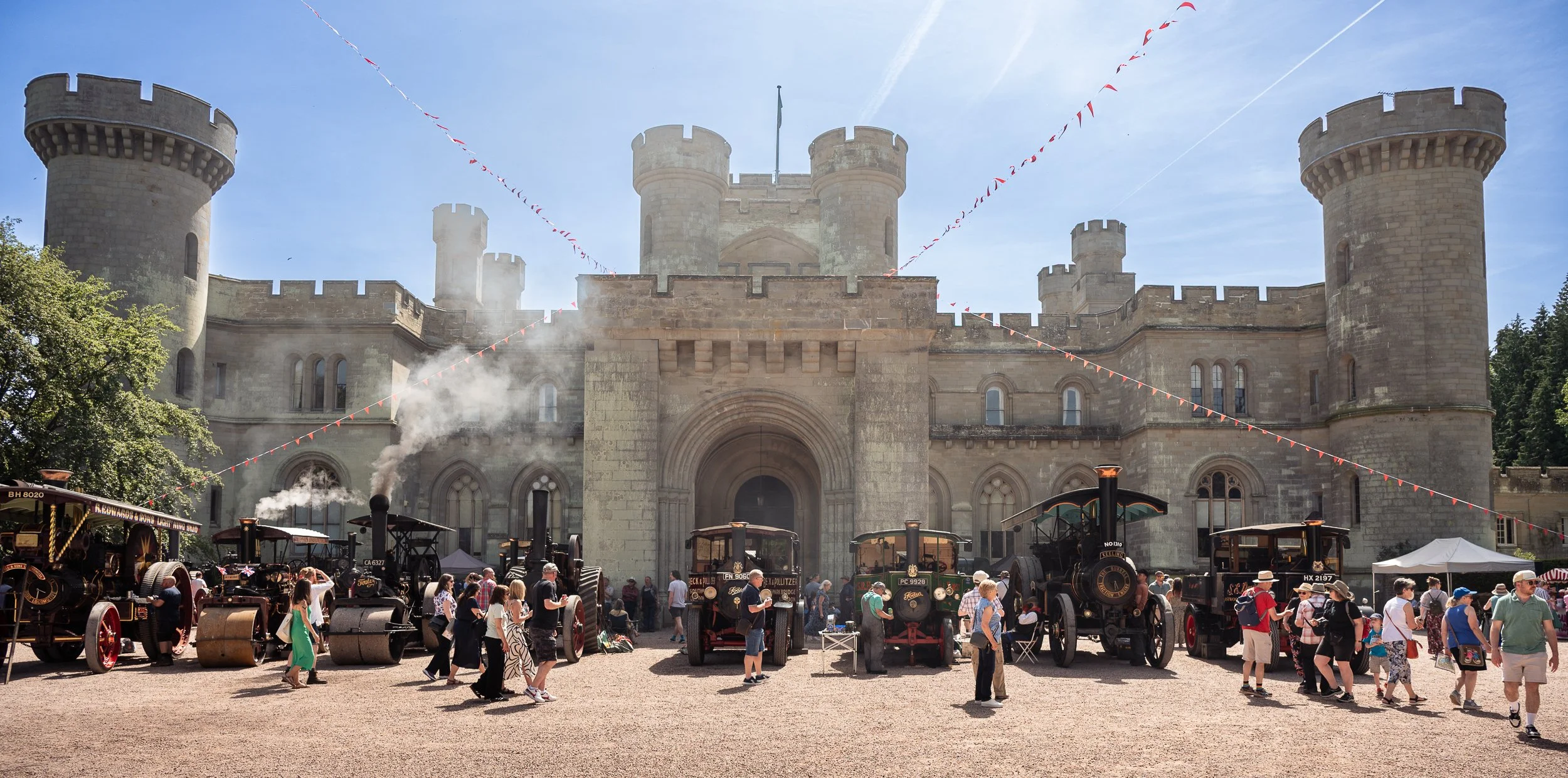steam engines in front of eastnor castle during a family day out taken by Chloe Bower Photography the best worcester based family photographer