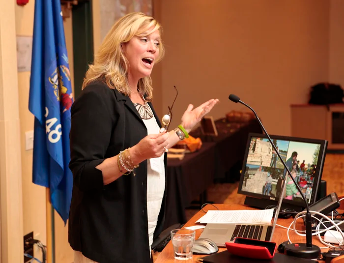 Inspirational health speaker Kathy Bero delivering a wellness keynote address