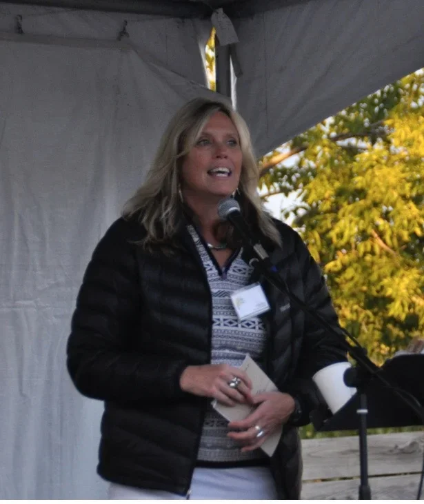 Inspirational health speaker Kathy Bero delivering a wellness keynote address.