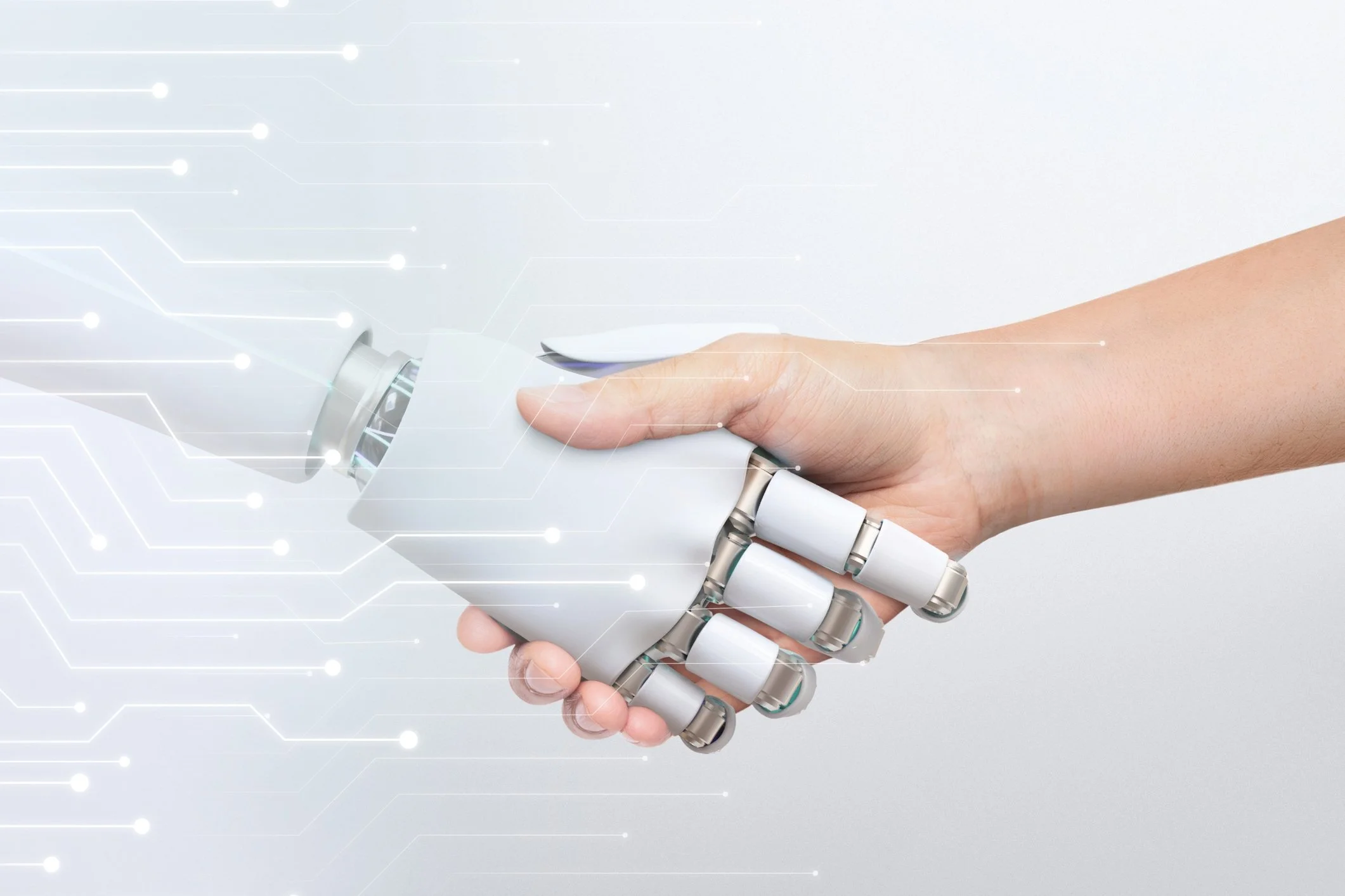 Robot hand and human hand shaking