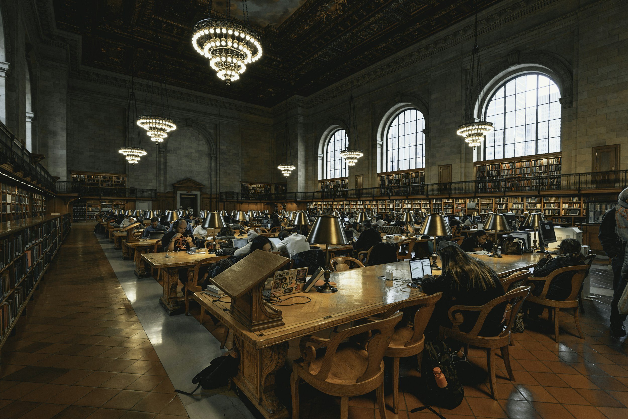 Students sitting in the library.
