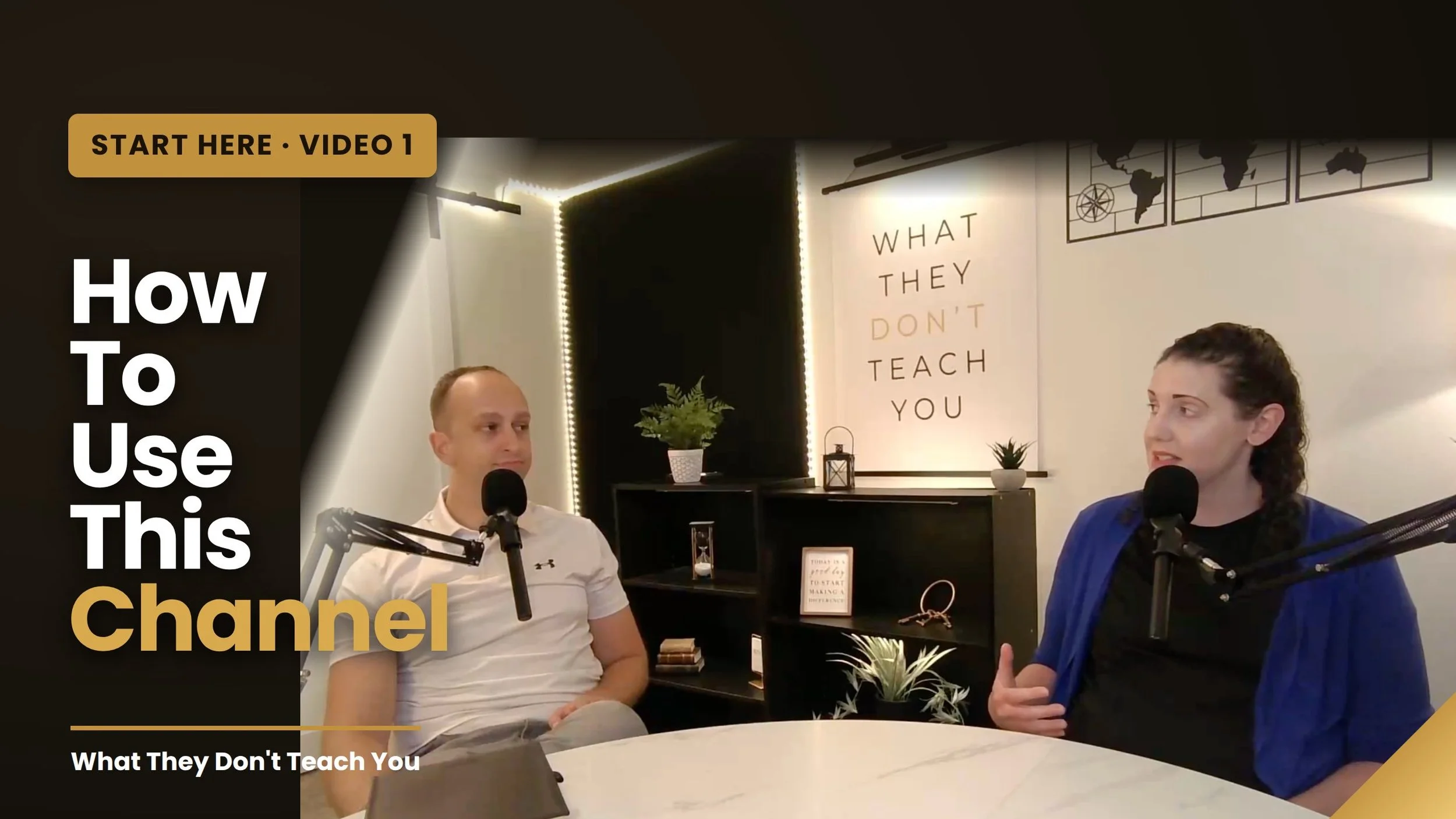 Two people are sitting at a table with microphones in front of them, engaging in a conversation in a studio or office setting. The room has a black and white color scheme with motivational and informational decor, including a sign that says 'What They Don't Teach You' on the wall and various plants and objects on shelves.