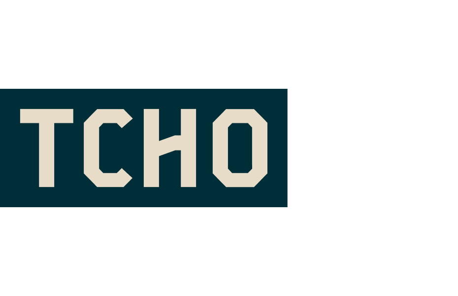 TCHO logo: bold cream-colored letters on a dark teal rectangular background