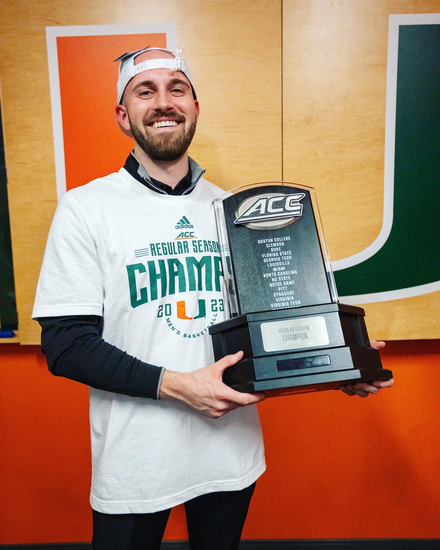 Tommy Otley celebrating after the University of Miami men's basketball win.