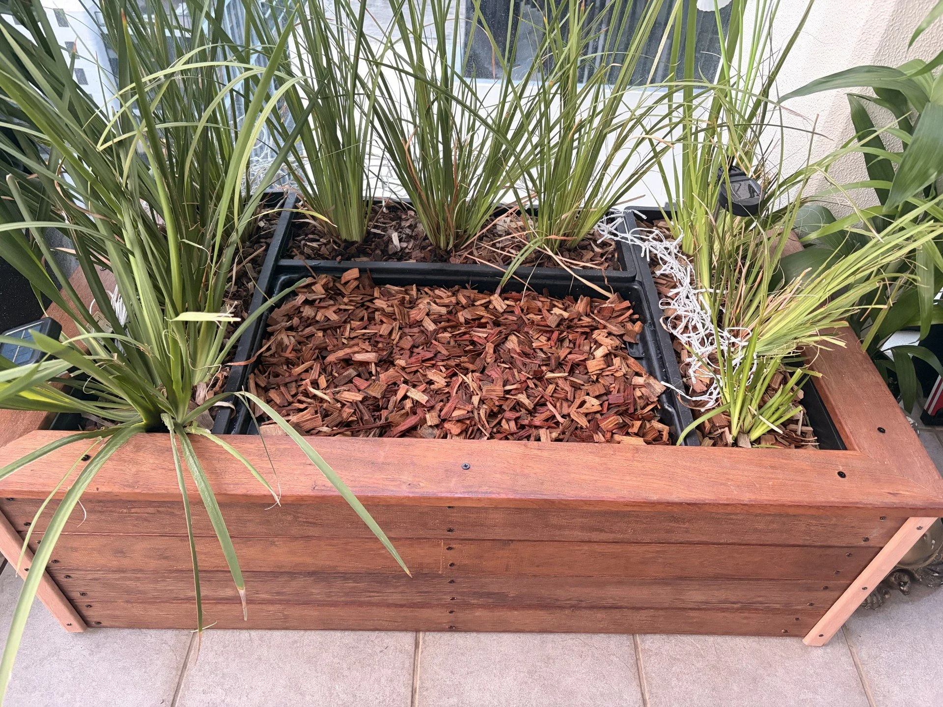 Finished balcony pet toilet installation, Brisbane CBD apartment