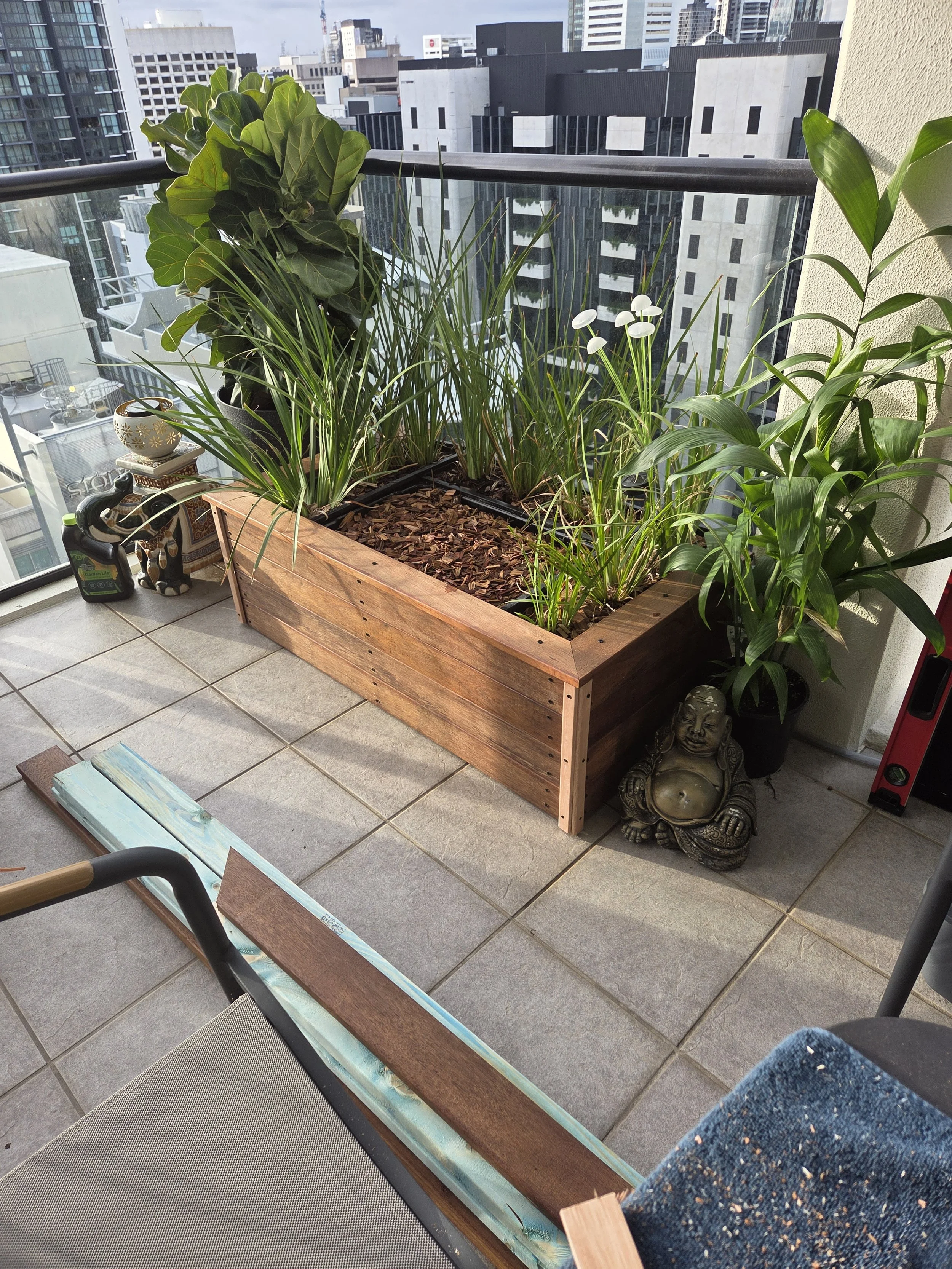 Finished balcony pet toilet installation, Brisbane CBD apartment