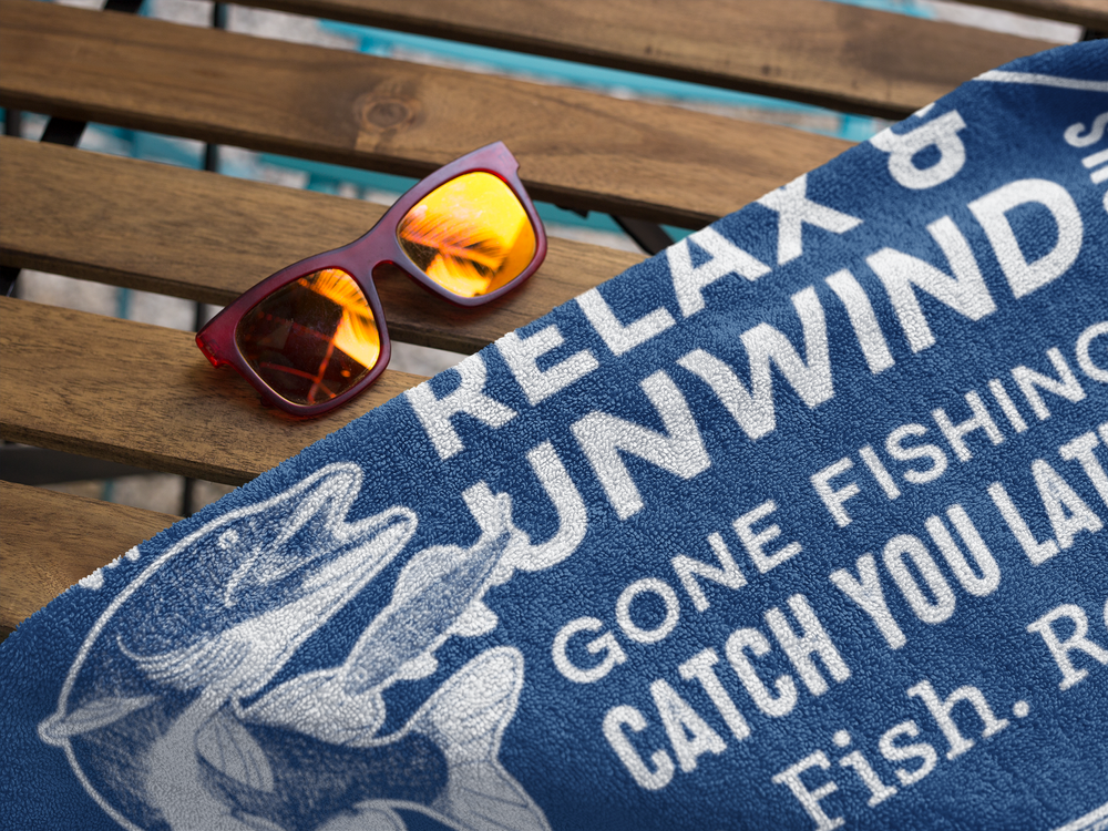 mockup-of-a-towel-on-a-wooden-bench-with-sunglasses-near-it-a14884.png
