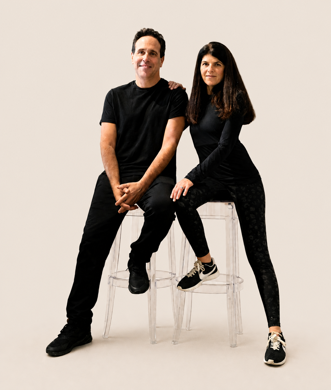 Jonathan Saint Shapiro and Rene seated together against a cream background. Author photo for THE READ.