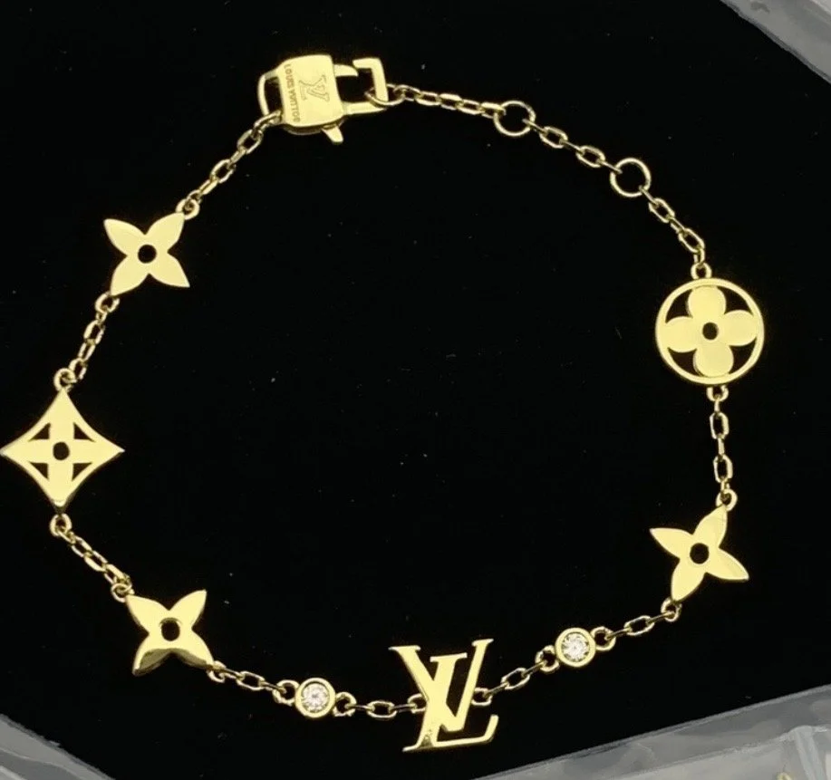 Clara's Exquisite Gold Tone Bracelet