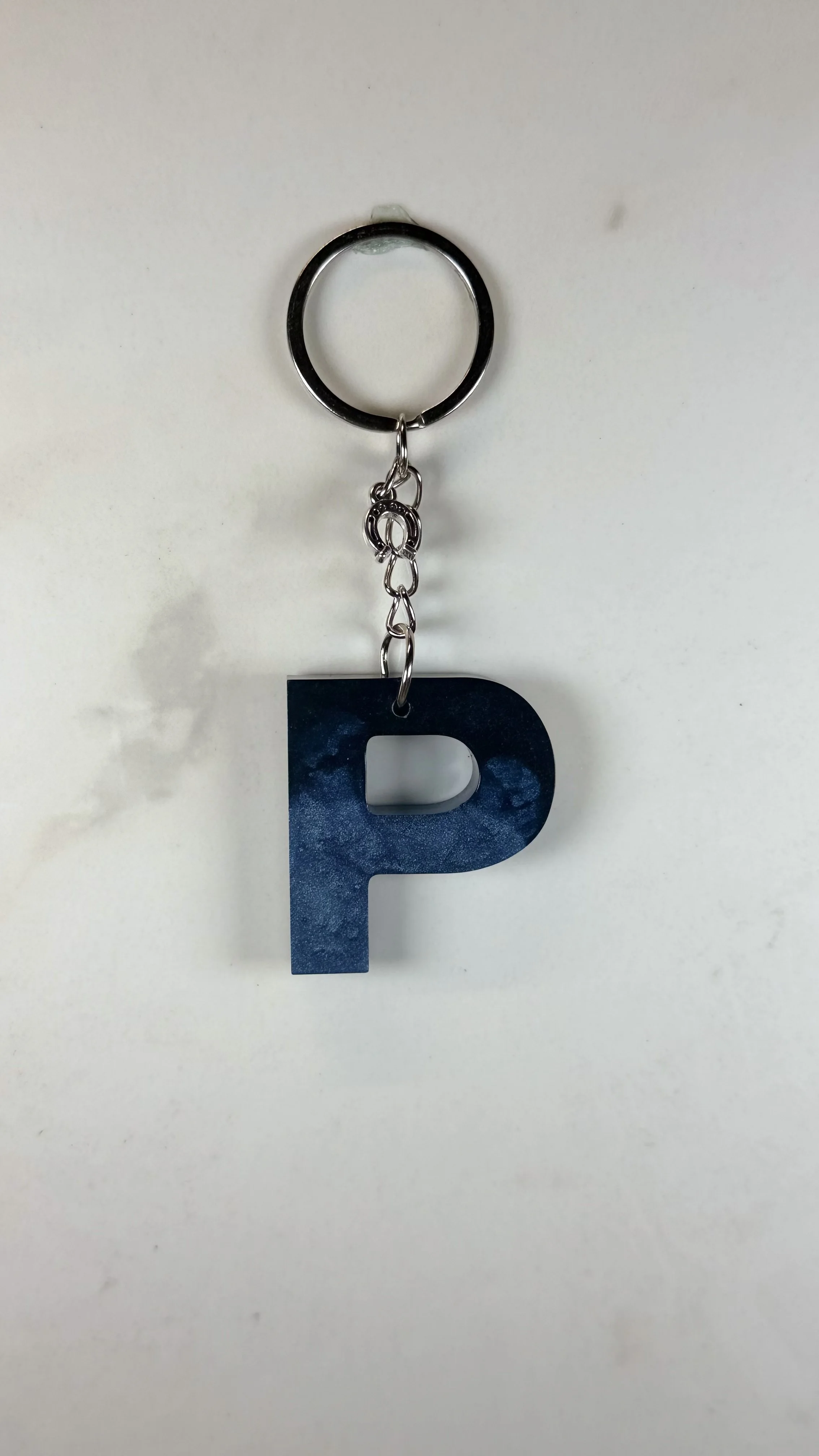 Blue & Black Resin Letter P Key Chain with Silver Horse Shoe Charm