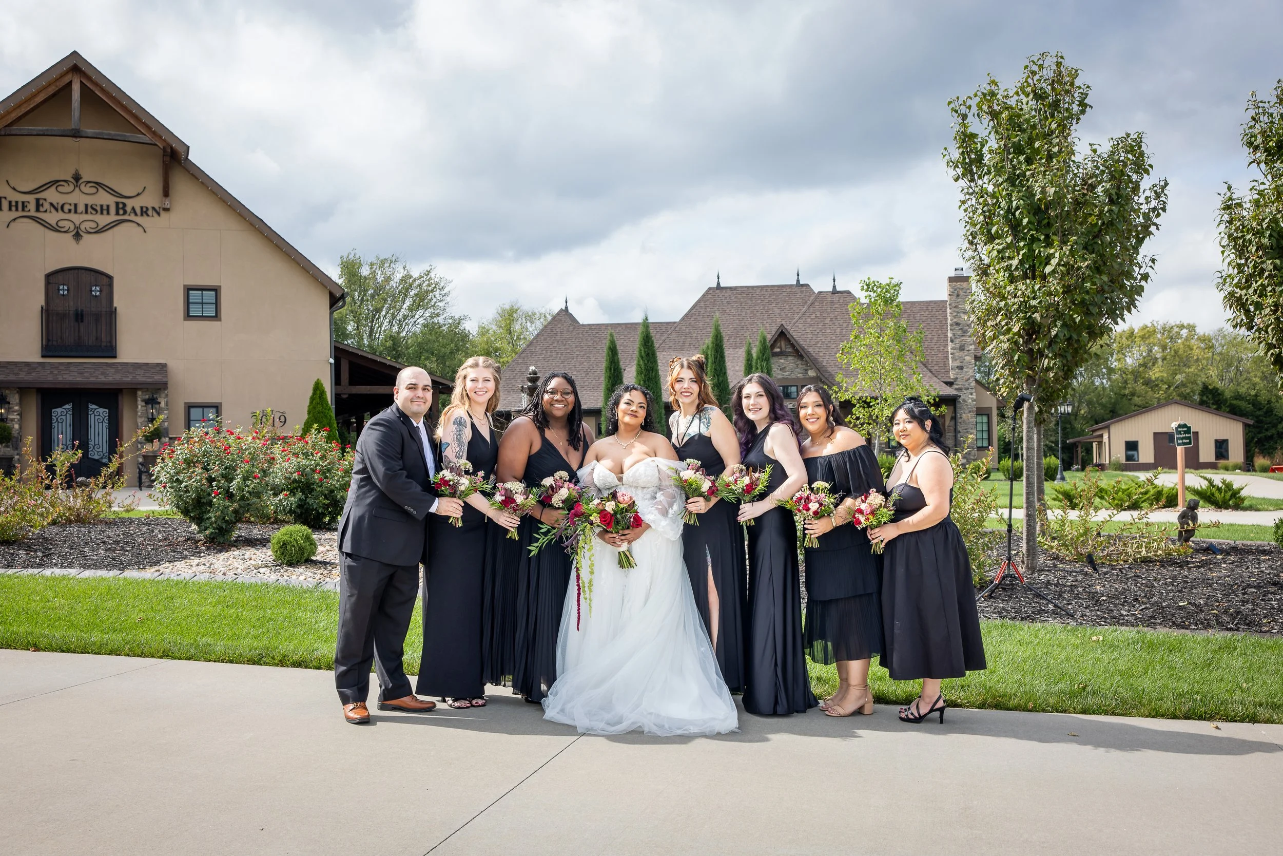Bridesmaids out in front of The English Barn