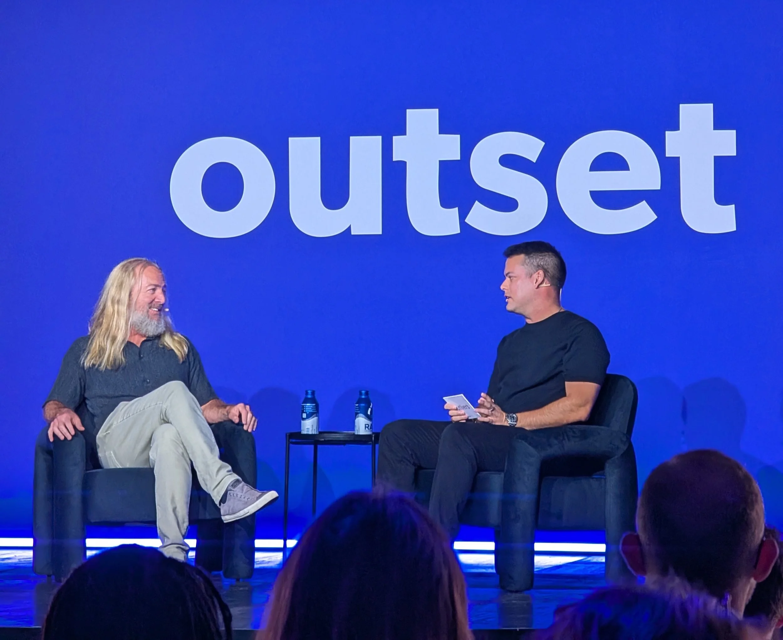 Mike Davidson, CVP of Microsoft AI, and Behzod Sirjani, Yet Another Studio founder, discussing the impact of AI on humanity and research on the main stage.