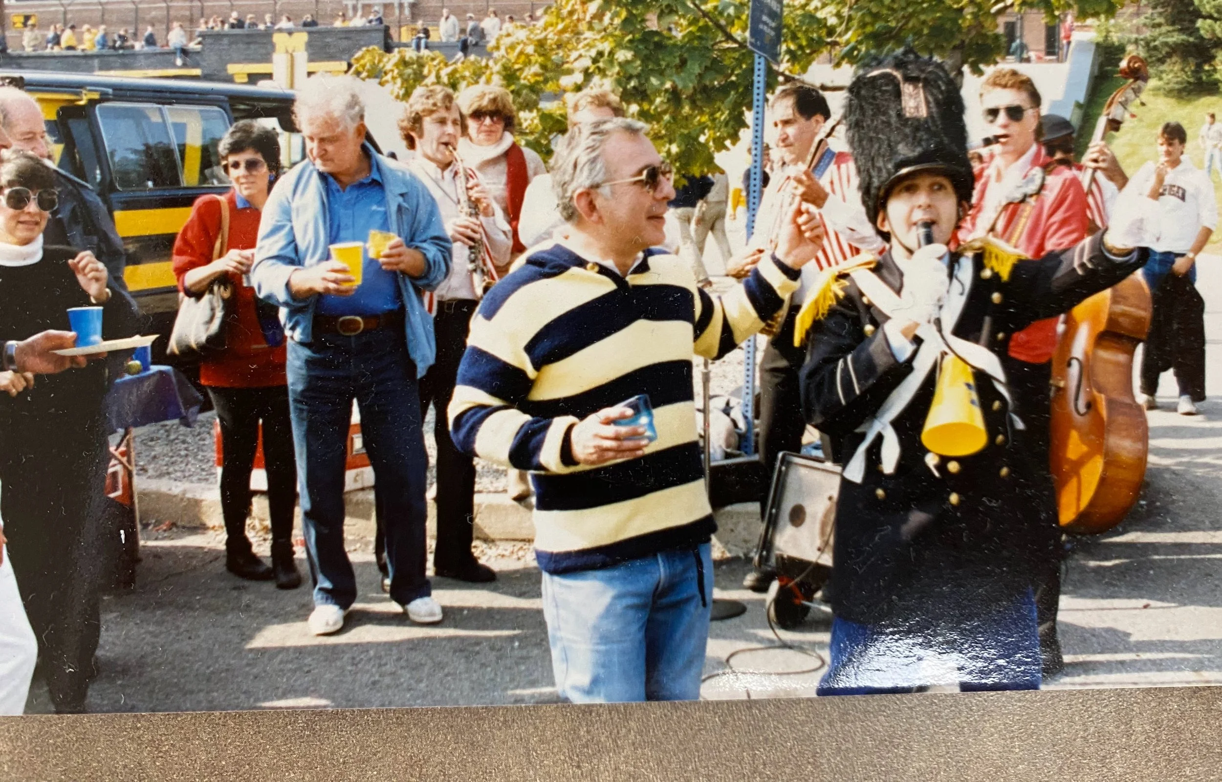 Matt_s Dad cheers band at tailgate.jpg