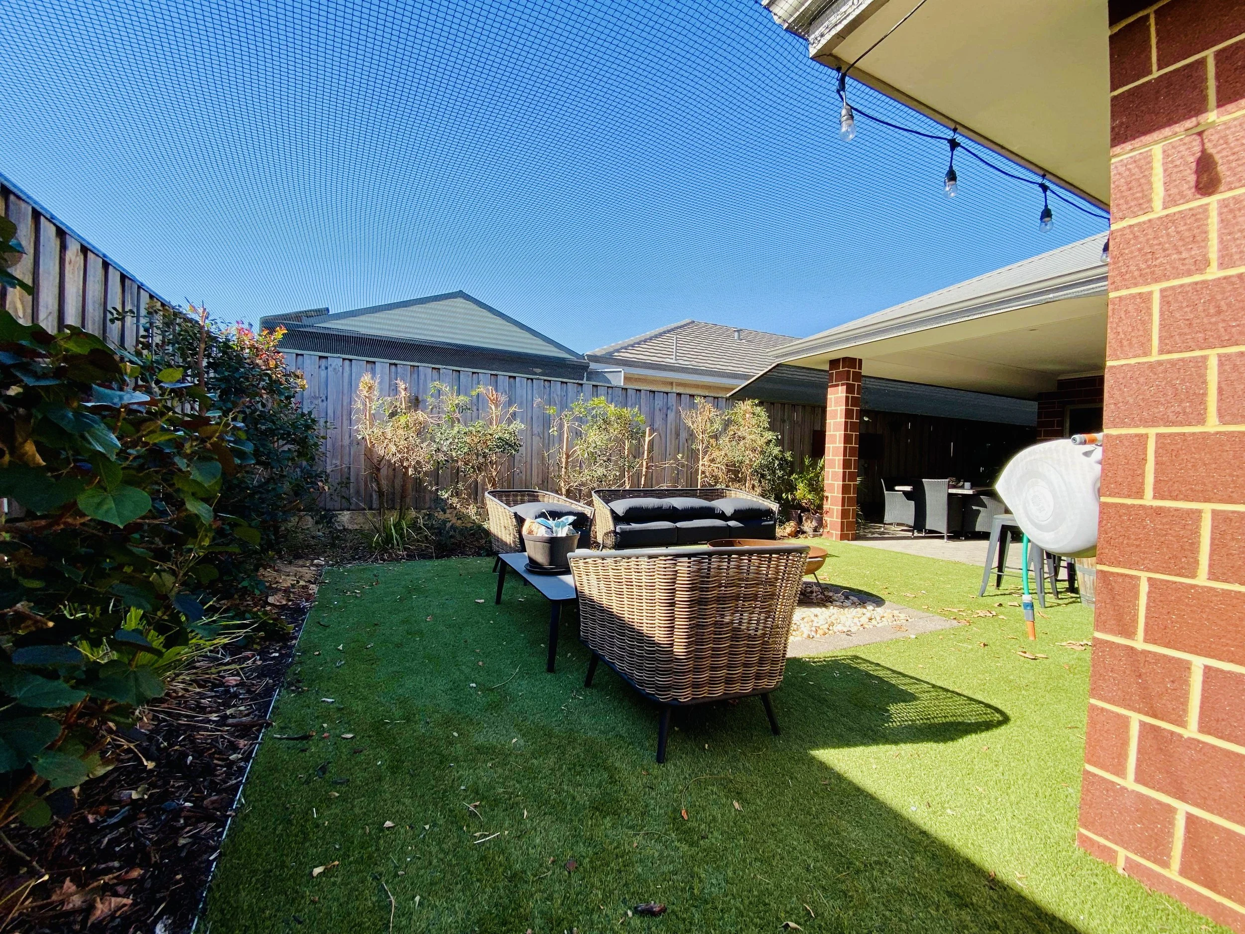 Backyard enclosure cat netting