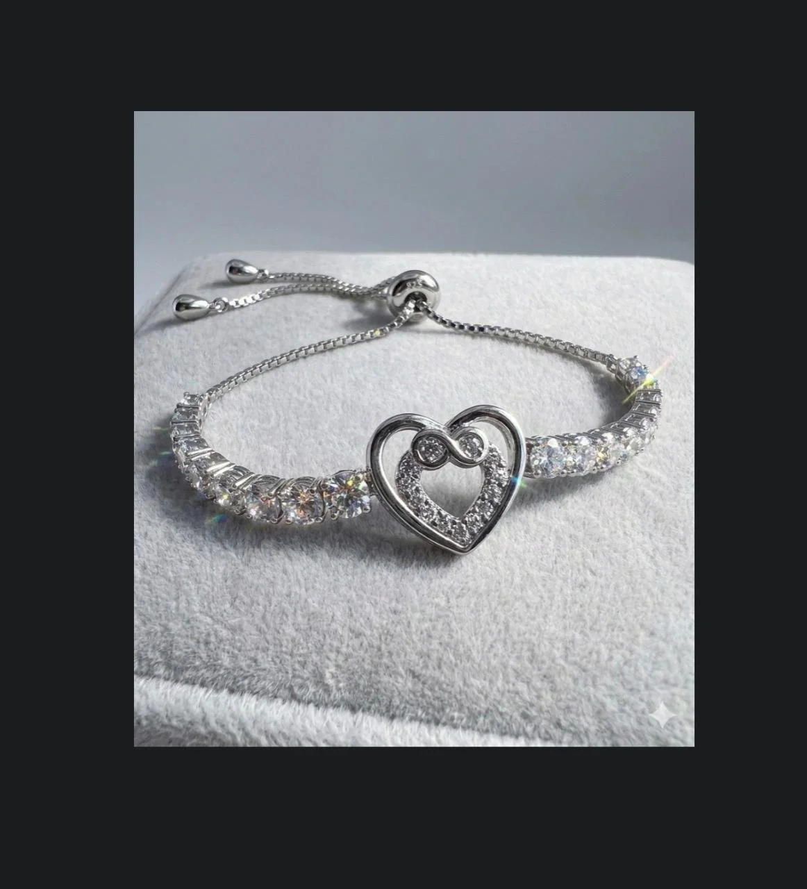 Sterling Silver heart-charm bolo bracelet