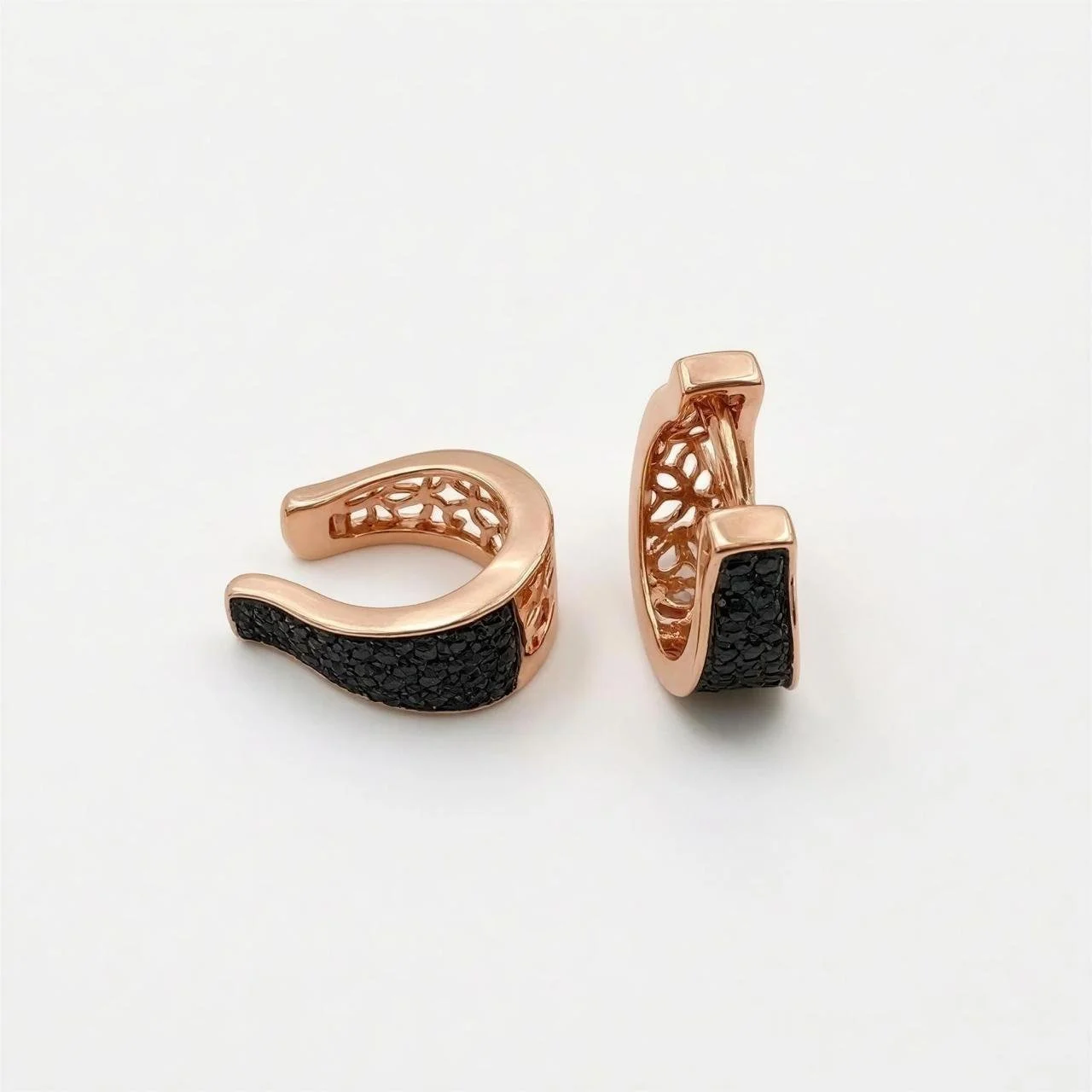 Rose gold plated huggies with black pavé