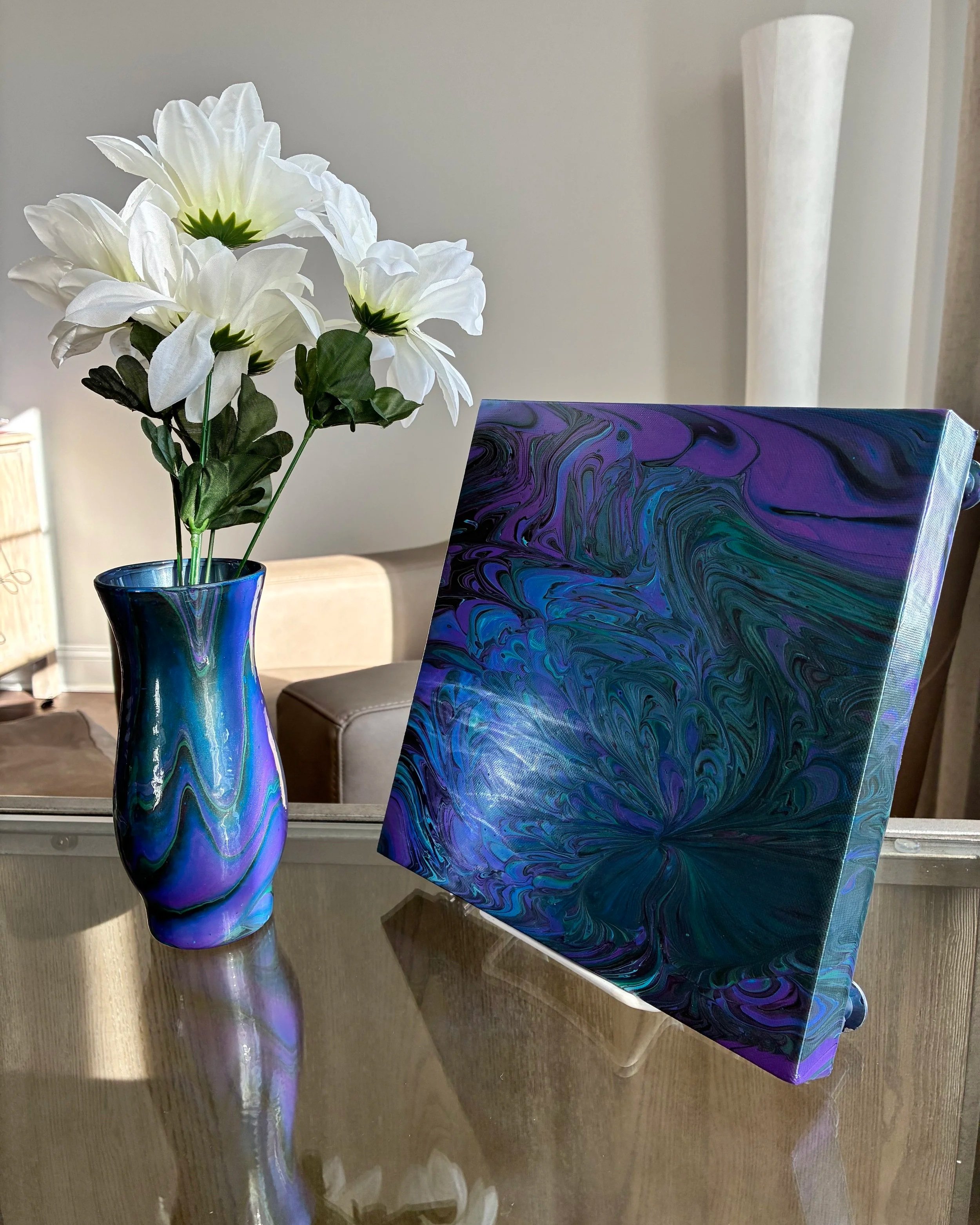 Modern abstract vase and canvas set in rich navy, purple, and metallic tones styled as a contemporary luxury art display.