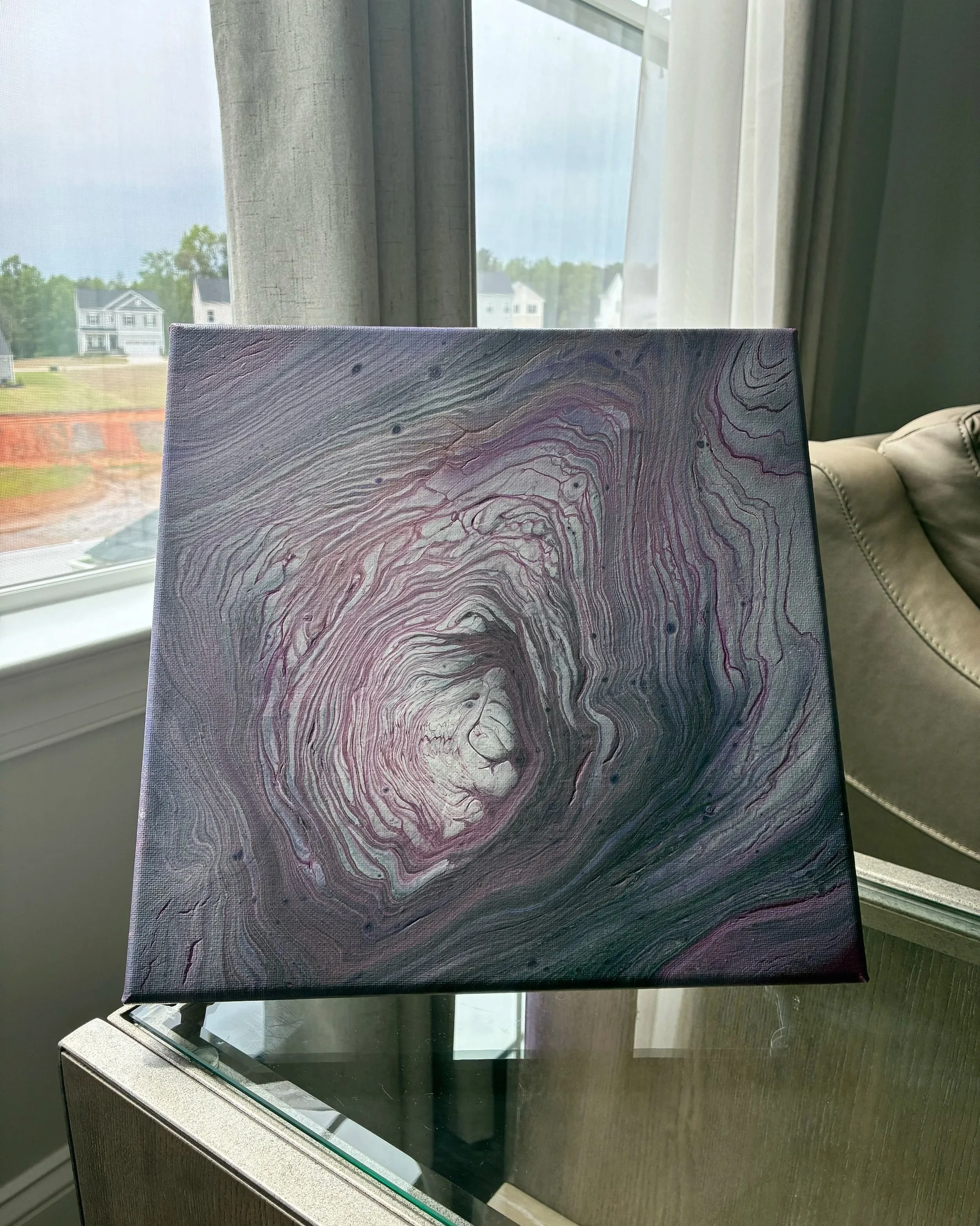 Midnight Bloom explores shadow, depth, and fluid emotion through layered violet movement and marbled detail