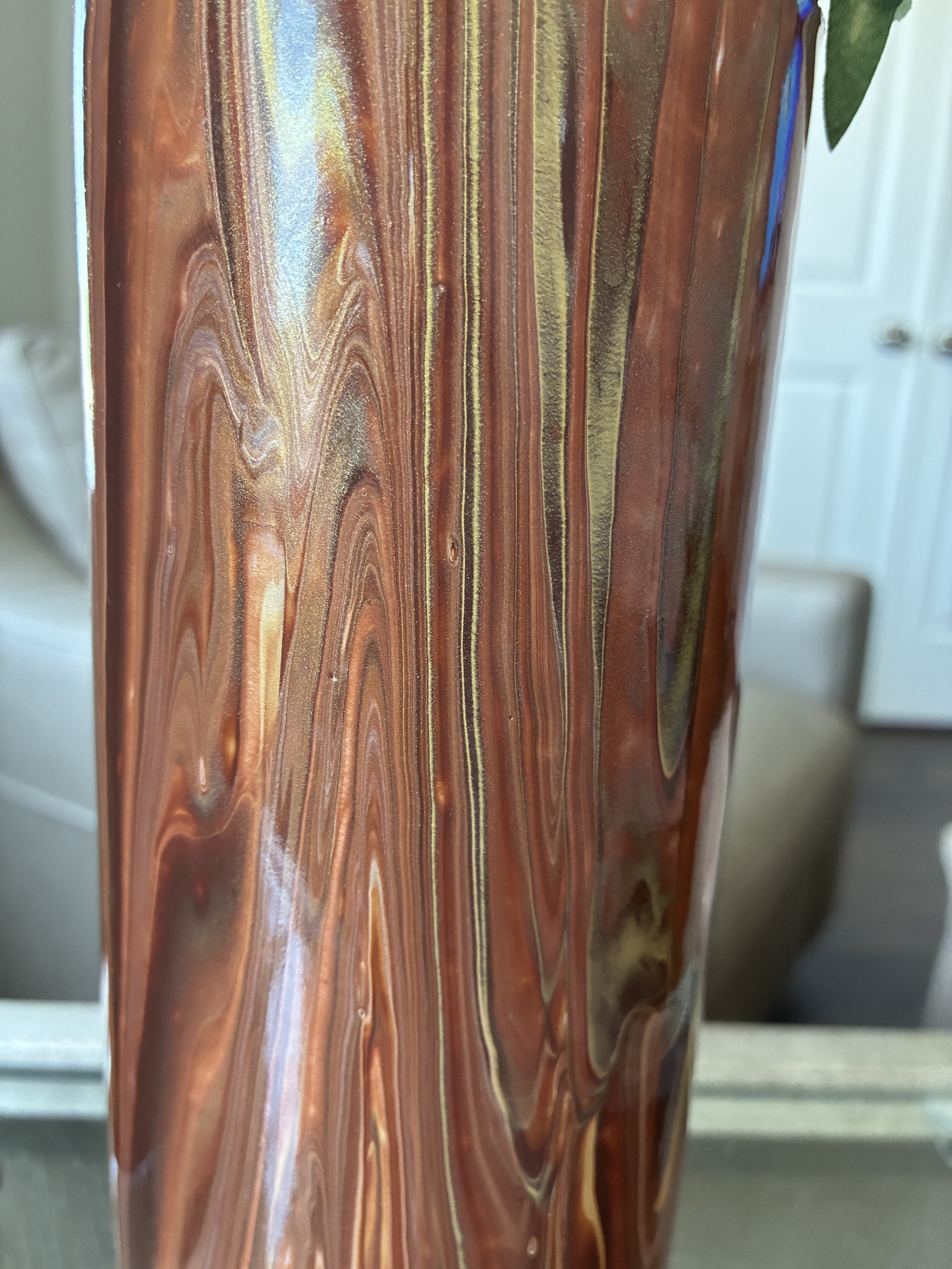 A closer look at the flowing bronze and copper currents that define Earthbound Echo. Layered tones and organic movement create a stone-like elegance inspired by nature's quiet beauty
