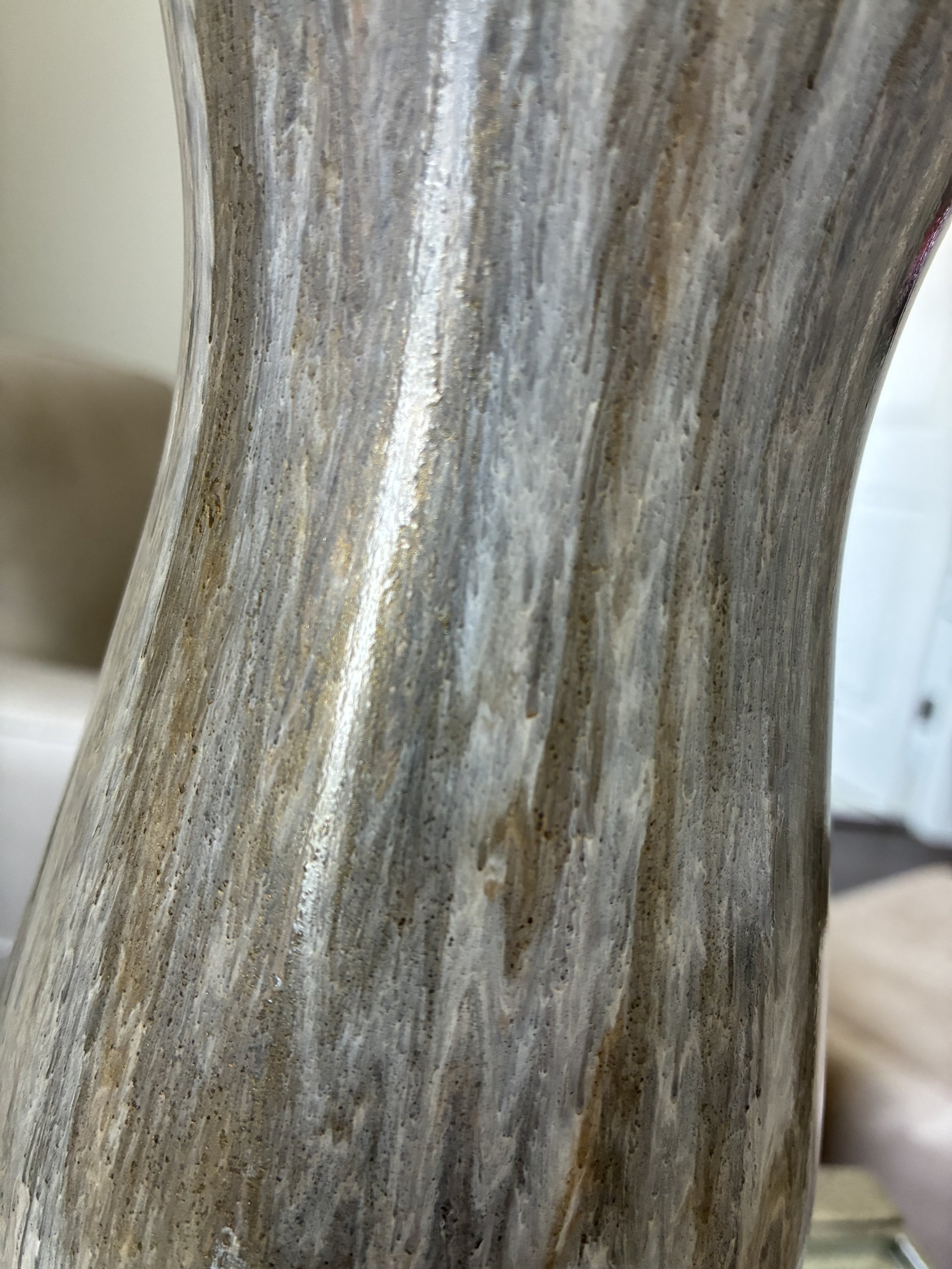 Stone Bloom — close-up detail of layered stone-inspired marbling with soft bronze, cream, and charcoal movement on a sculptural vase surface.